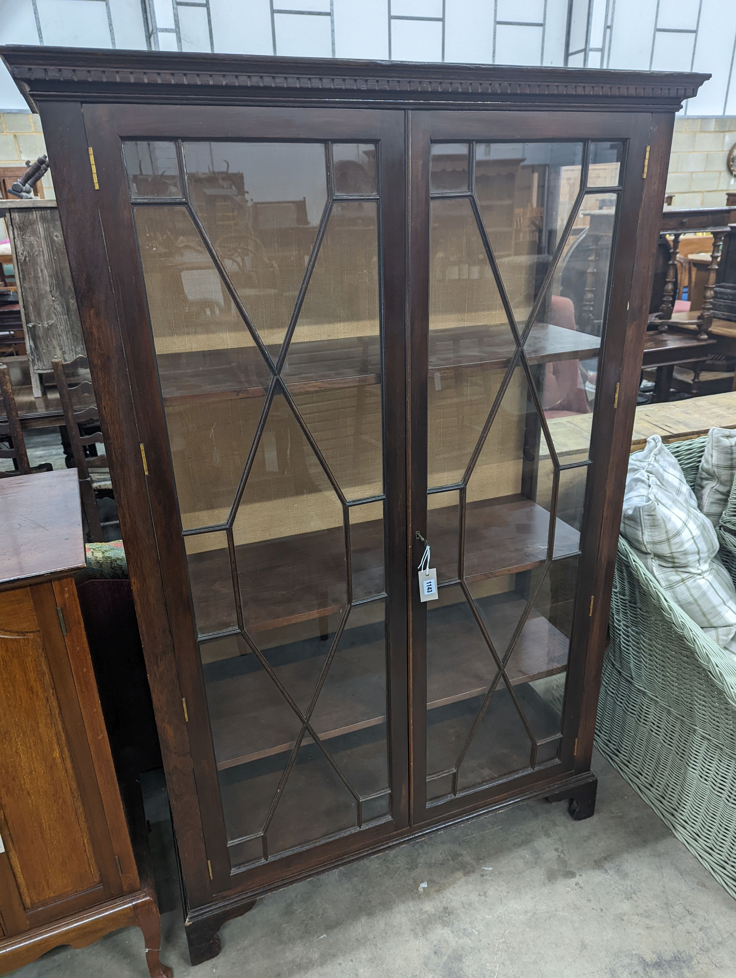 A reproduction George III style glazed mahogany two door display cabinet, width 108cm, depth 40cm, height 172cm
